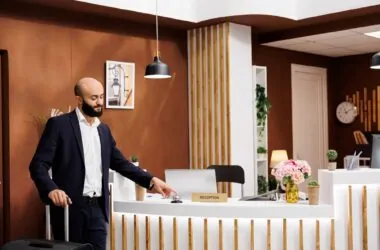 Businessman at hotel front desk