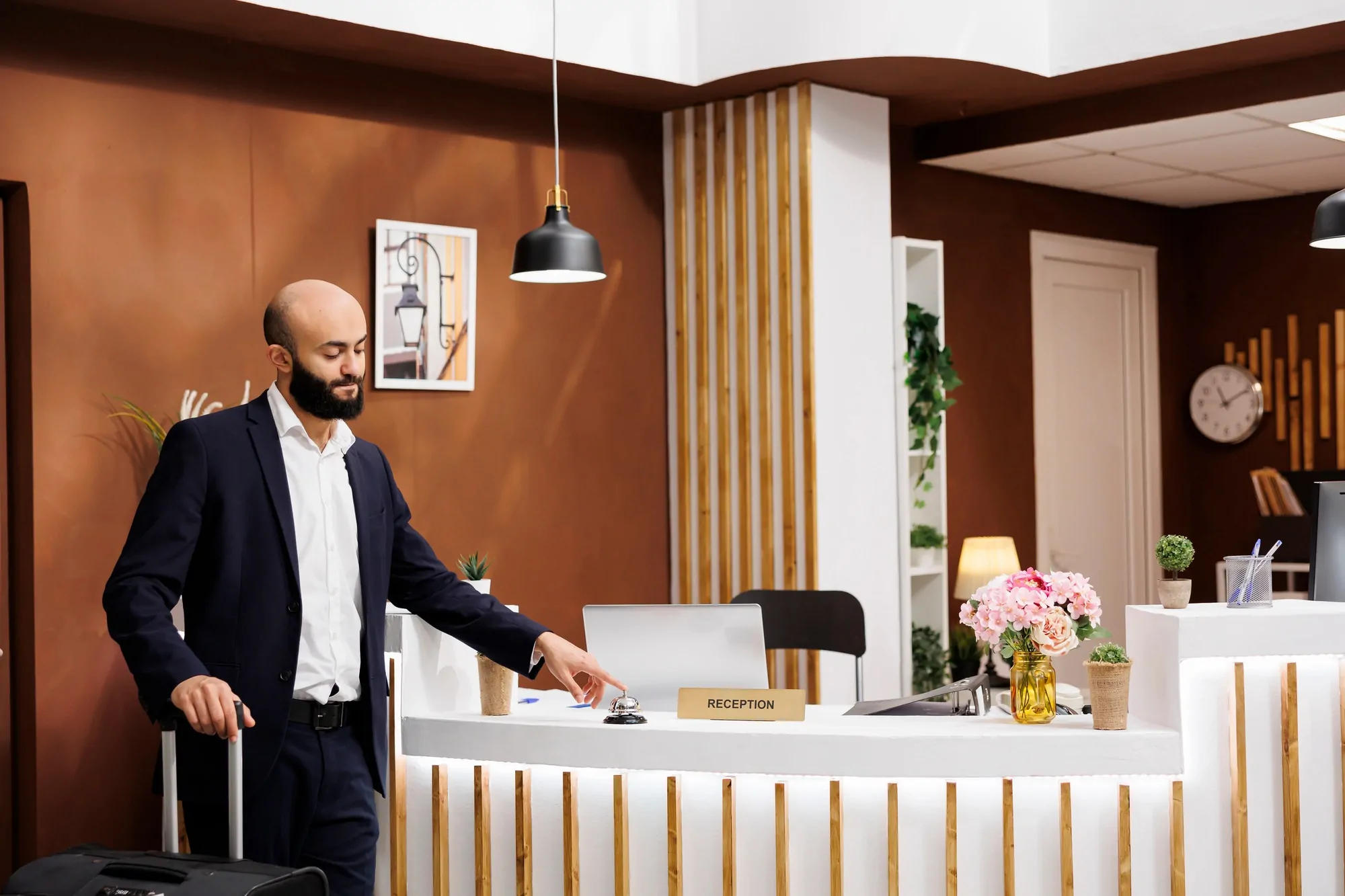 Businessman at hotel front desk